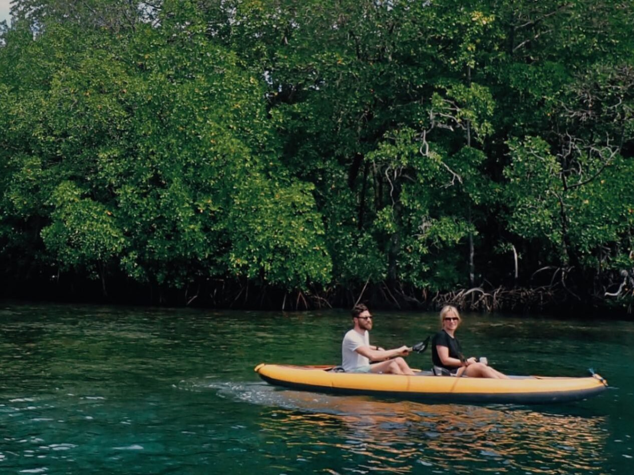 Guests kayaking in Raja Ampat