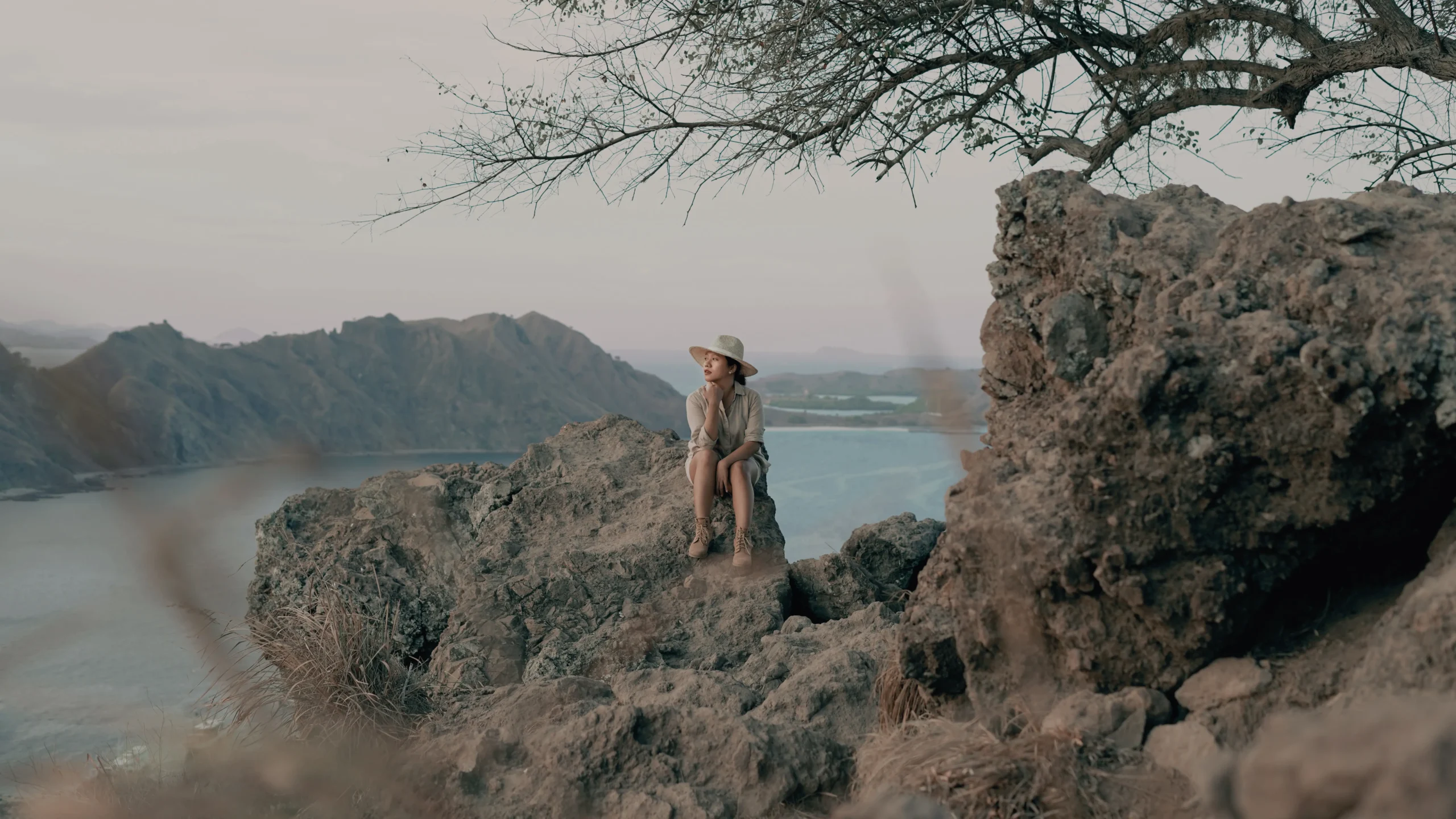 Girl posing for a photo in Padar Island of Komodo National Park on a Liveaboard cruise